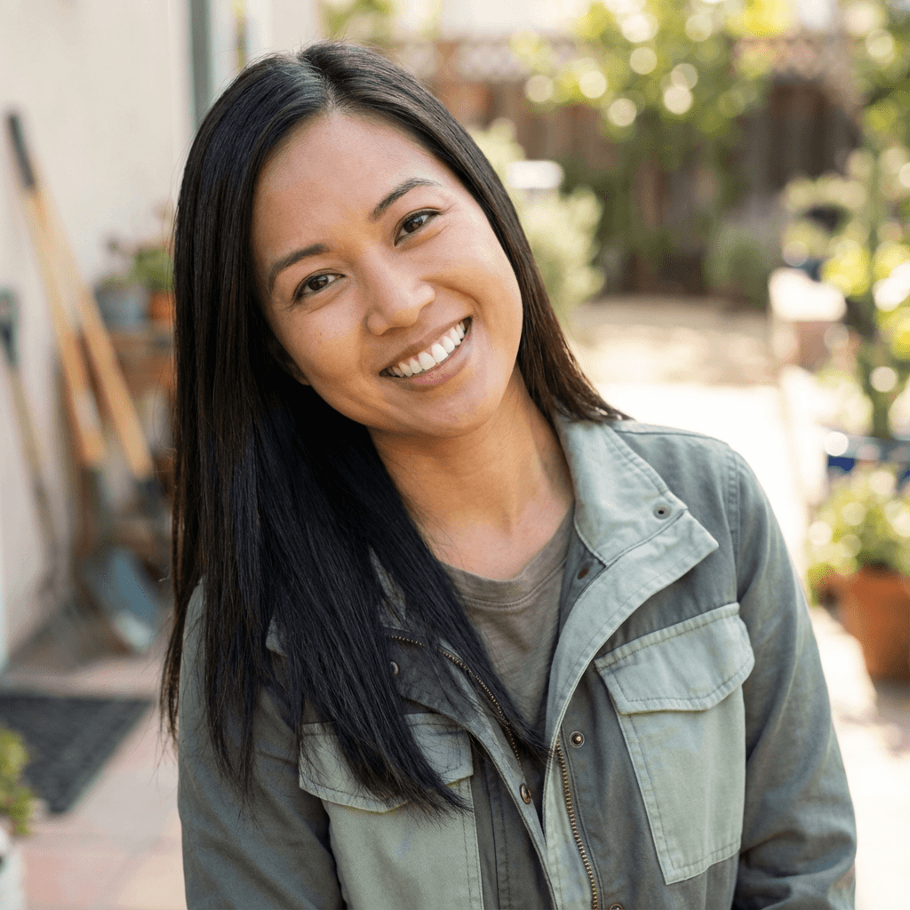 Sarah Chen in a blazer in a bright office